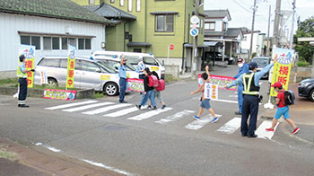 登下校の見守り